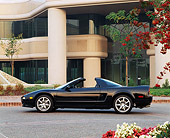 AUT 25 RK0325 08
1996 Acura NSX Black Profile View On Pavement By Building