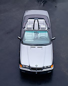 AUT 25 RK0382 03
1995 BMW 318i Convertible Silver Overhead Top View On Pavement