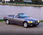 AUT 25 RK0389 06
1995 BMW 318i Convertible Silver 3/4 Front View On Pavememnt By Water At Dusk