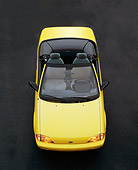 AUT 25 RK0395 04
1990 Geo Metro Convertible Yellow Overhead Head On Shot On Pavement