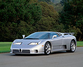 AUT 25 RK0446 01
1994 Bugatti EB110 Silver Front 3/4 View On Pavement By Grass And Trees