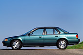 AUT 25 RK0479 10
1993 Honda Accord Teal Profile View On Pavement Blue Sky