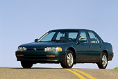 AUT 25 RK0483 06
1993 Honda Accord Teal 3/4 Front View On Pavement Blue Sky