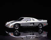 AUT 25 RK0529 02
1990 Consulier GTP Silver Side 3/4 View On Mylar Floor Studio