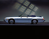 AUT 25 RK0591 05
1990 Jaguar XJS Sport Convertible Blue Profile On Gray Line Grphic Background