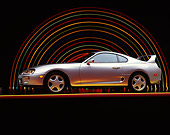 AUT 25 RK0638 02
1994 Toyota Supra Twin Turbo Silver Low 3/4 Side View On Red & Yellow Lines Arc Of Lights Headlights On