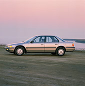 AUT 25 RK0819 01
1990 Honda Accord Silver 3/4 Front View On Gravel At Dusk