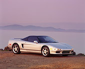 AUT 25 RK0922 05
1993 Acura NSX Silver 3/4 Front View On Gravel By Water Filtered