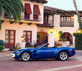 AUT 25 RK0957 03
1990's Chevrolet Corvette Guldstrand Nassau Roadster Convertible Side View By Spanish Building