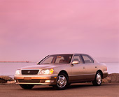 AUT 25 RK1022 01
1999 Lexus LS400 Gold 3/4 Front View On Pavement By Water Filtered