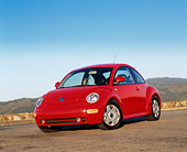 AUT 25 RK1100 06
1999 Volkswagen New Beetle Turbo Red Slanted 3/4 Front View On Pavement