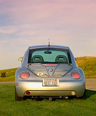 AUT 25 RK1136 01
1998 VW Beetle Turbo Silver Rear View On Grass Pink Sky