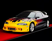 AUT 25 RK1169 09
1999 Mitsubishi Eclipse GSX Custom Hot Rod Black With Flames 3/4 Front View On Red Floor Studio