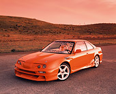AUT 25 RK1197 03
1992 Acura Integra GS Orange Front 3/4 View On Pavement By Hills Filtered