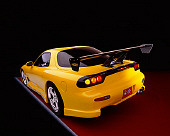 AUT 25 RK1291 08
1993 Mazda RX7 Yellow Custom Wide Angle