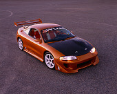 AUT 25 RK1292 03
1997 Mitsubishi Eclispe Custom Orange