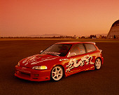 AUT 25 RK1319 01
1994 Honda Civic Hatch Back Red With White Graphics