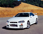 AUT 25 RK1359 04
1999 Nissan Skyline GTR R34 White 3/4 Front View On Pavement By Dry Grass Hills