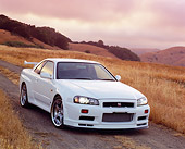 AUT 25 RK1362 02
1999 Nissan Skyline GTR R34 White 3/4 Front View On Dry Grass Hill