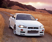 AUT 25 RK1363 05
1999 Nissan Skyline GTR R34 White 3/4 Front View On Dry Grass Hill
