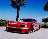 AUT 25 RK1373 03
1999 Nissan Skyline Nismo Race Car Red Low 3/4 Front View By Palm Trees