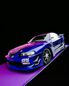 AUT 25 RK1387 07
1995 JDM Honda Prelude Si Vtech Custom Fabrication Aero Kit Blue 3/4 Front View Studio
