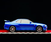 AUT 25 RK1392 07
1999 Nissan Skyline GTR Blue Profile View On Checkered Line Red Floor Studio