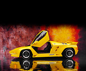 AUT 25 RK1403 04
1992 Vector W8 Yellow Profile View Door Open On Mylar Floor Sunburst Background