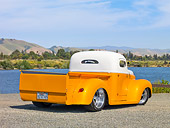 AUT 26 RK2780 01
1947 International Pickup Truck Hot Rod Orange And White 3/4 Rear View On Gravel By Lake And Hills