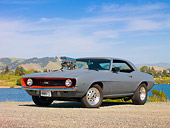 AUT 26 RK2783 01
1969 Chevrolet Camaro Gray 3/4 Front View On Gravel By Lake And Hills