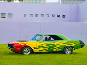 AUT 26 RK2807 01
1970 Dodge Dart Swinger Hot Rod Red, Yellow, Green Profile View On Grass By Building