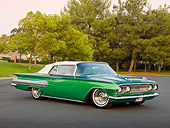 AUT 26 RK2815 01
1960 Chevrolet Impala Convertible Hot Rod Green 3/4 Front View On Pavement By Trees
