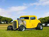AUT 26 RK2891 01
1932 Ford 3 Window Coupe Hot Rod Yellow With Flames 3/4 Front View On Grass