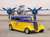 AUT 26 RK2896 01
1933 Ford Vicky Hot Rod Yellow And Purple 3/4 Front View On Pavement By Airplane