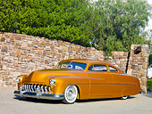 AUT 26 RK2900 01
1951 Mercury Coupe Hot Rod Gold 3/4 Front View On Pavement By Stone Wall