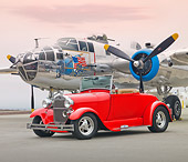 AUT 26 RK2908 01
1929 Ford Roadster Hot Rod Red 3/4 Front View On Pavement By Airplane