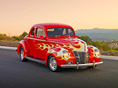 AUT 26 RK2935 01
1940 Ford Deluxe Coupe Hot Rod Red With Flames 3/4 Front View On Pavement