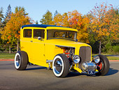 AUT 26 RK2939 01
1931 Ford Sedan Hot Rod Yellow 3/4 Front View On Pavement By Trees