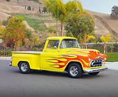AUT 26 RK2952 01
1957 Chevrolet 3100 Pickup Truck Hot Rod Yellow With Flames 3/4 Front View On Pavement