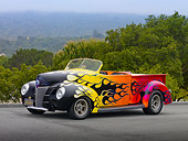AUT 26 RK3037 01
1939 Ford Pickup Hot Rod Yellow, Orange And Pink With Black Flames 3/4 Front View On Pavement By Trees