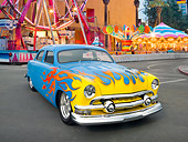 AUT 26 RK3233 01
1951 Ford 4-Door Chopped Sky Blue With Sunset Flames 3/4 Front View On Pavement