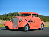 AUT 26 RK3254 01
1934 Chevrolet 5 Window Coupe Sea Coral With Flames 3/4 Front View On Pavement
