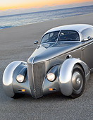 AUT 26 RK3295 01
1936 Ford AeroSport Silver 3/4 Front View On Pavement By Ocean At Dusk