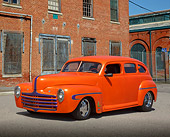 AUT 26 RK3367 01
1946 Ford Sedan Hot Rod Orange 3/4 Front View On Pavement By Brick Building