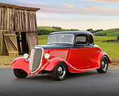 AUT 26 RK3378 01
1934 Ford Coupe Red And Black 3/4 Front View On Pavement By Old Wooden Shed