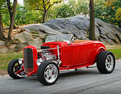 AUT 26 RK3385 01
1932 Ford Roadster Red 3/4 Front View On Pavement By Trees