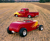 AUT 26 RK0046 03
1932 Ford Roadster & 1952 Chevrolet Pickup Red Yellow Flames 3/4 Rear View In Farm Field