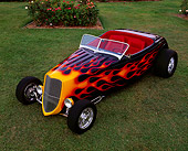 AUT 26 RK0085 03
1933 Ford Hi Boy Convertible Black With Flames 3/4 Front View On Grass