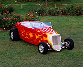 AUT 26 RK0089 05
1933 Ford Hi Boy Convertible Red With Flames Front 3/4 View On Grass