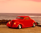 AUT 26 RK0186 03
1937 Ford 3 Window Coupe 350 Red 3/4 Side View on Sand By Ocean Filtered